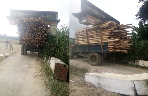 Bi hài cảnh xe tải cõng cổng làng chạy trên đường - Ảnh 3. Bi hài cảnh xe tải cõng cổng làng chạy trên đường - Ảnh 3.