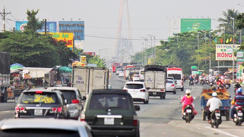Xả trạm thu phí, cầu Rạch Miễu vẫn thất thủ - Ảnh 4. Xả trạm thu phí, cầu Rạch Miễu vẫn thất thủ - Ảnh 4.