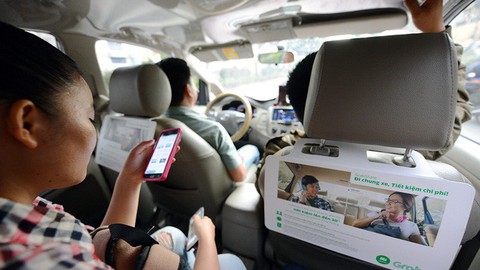 Tài xế Grab, Uber mỗi ngày kiếm 3 triệu nhờ giá tết mà! - Ảnh 1. Tài xế Grab, Uber mỗi ngày kiếm 3 triệu nhờ giá tết mà! - Ảnh 1.