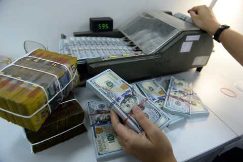 Giá USD tăng thêm 40 đồng so với trước tết - Ảnh 1. Giá USD tăng thêm 40 đồng so với trước tết - Ảnh 1.