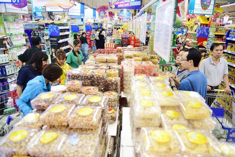 Tiêu dùng tháng Tết đẩy giá cả tháng 2 tăng mạnh - Ảnh 1. Tiêu dùng tháng Tết đẩy giá cả tháng 2 tăng mạnh - Ảnh 1.