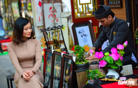 Giới trẻ Sài Gòn xuống phố chụp hình đón tết - Ảnh 7. Giới trẻ Sài Gòn xuống phố chụp hình đón tết - Ảnh 7.