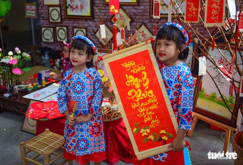 Giới trẻ Sài Gòn xuống phố chụp hình đón tết - Ảnh 14. Giới trẻ Sài Gòn xuống phố chụp hình đón tết - Ảnh 14.