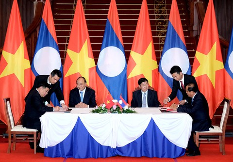 Việt - Lào ký kết nhiều văn kiện hợp tác về năng lượng - Ảnh 1. Việt - Lào ký kết nhiều văn kiện hợp tác về năng lượng - Ảnh 1.