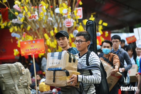 Chuyến xe mùa xuân đưa 3.000 sinh viên về quê đón Tết - Ảnh 2. Chuyến xe mùa xuân đưa 3.000 sinh viên về quê đón Tết - Ảnh 2.