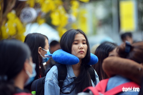 Chuyến xe mùa xuân đưa 3.000 sinh viên về quê đón Tết - Ảnh 3. Chuyến xe mùa xuân đưa 3.000 sinh viên về quê đón Tết - Ảnh 3.