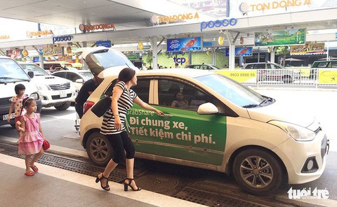 Cho thuê thân xe để quảng cáo Grab, chủ xe phải nộp thuế 7% - Ảnh 1. Cho thuê thân xe để quảng cáo Grab, chủ xe phải nộp thuế 7% - Ảnh 1.