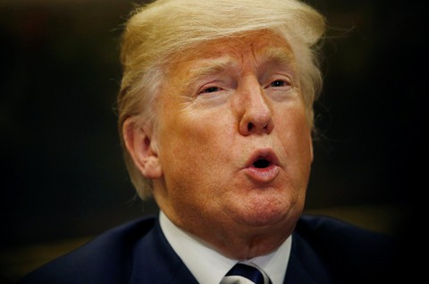 Ông Trump chịu chỉ trích vì chúc mừng ông Putin - Ảnh 1. Ông Trump chịu chỉ trích vì chúc mừng ông Putin - Ảnh 1.