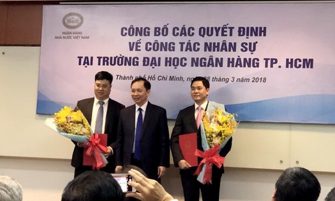 Hai cán bộ Ngân hàng nhà nước làm lãnh đạo ĐH Ngân hàng TP.HCM - Ảnh 1. Hai cán bộ Ngân hàng nhà nước làm lãnh đạo ĐH Ngân hàng TP.HCM - Ảnh 1.