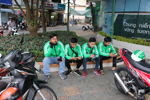 Chưa vội ‘luận tội’ Grab mua Uber là độc quyền hay phạm luật - Ảnh 1.