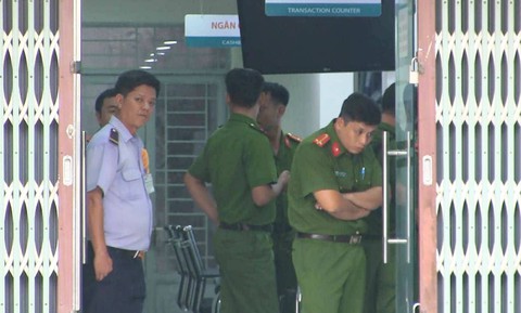 Điều tra nghi án dùng súng cướp ngân hàng ABBank - Ảnh 1. Điều tra nghi án dùng súng cướp ngân hàng ABBank - Ảnh 1.