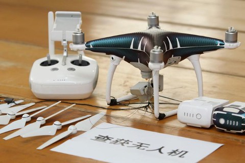 Trung Quốc bắt vụ buôn lậu iPhone bằng drone trị giá 80 triệu USD - Ảnh 1. Trung Quốc bắt vụ buôn lậu iPhone bằng drone trị giá 80 triệu USD - Ảnh 1.