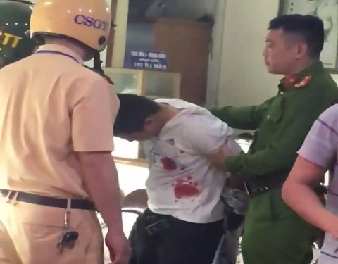 Bắt nghi phạm dùng súng cướp tiệm vàng ở Hà Nội - Ảnh 1. Bắt nghi phạm dùng súng cướp tiệm vàng ở Hà Nội - Ảnh 1.