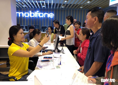 Người Sài Gòn hối hả cập nhật ảnh chân dung thuê bao - Ảnh 19. Người Sài Gòn hối hả cập nhật ảnh chân dung thuê bao - Ảnh 19.