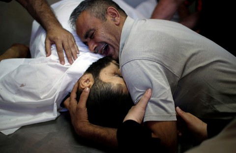 Israel bắn chết 43 người Palestine trong ngày khai trương sứ quán Mỹ - Ảnh 1. Israel bắn chết 43 người Palestine trong ngày khai trương sứ quán Mỹ - Ảnh 1.