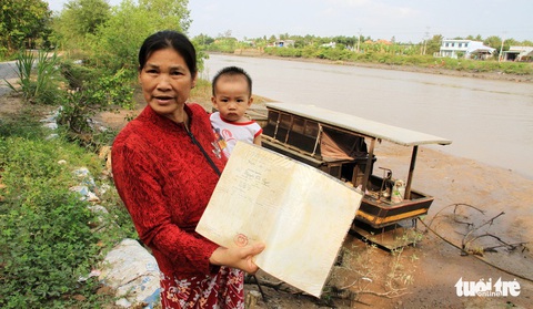 Sống thấp thỏm trên vùng kênh Chợ Gạo sạt lở - Ảnh 3. Sống thấp thỏm trên vùng kênh Chợ Gạo sạt lở - Ảnh 3.