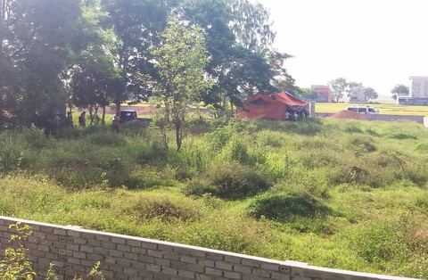 Khai quật tử thi nữ kế toán trưởng chết 6 năm trước để điều tra - Ảnh 1. Khai quật tử thi nữ kế toán trưởng chết 6 năm trước để điều tra - Ảnh 1.