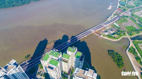 TP.HCM thông xe cầu qua đảo Kim Cương - Ảnh 14. TP.HCM thông xe cầu qua đảo Kim Cương - Ảnh 14.
