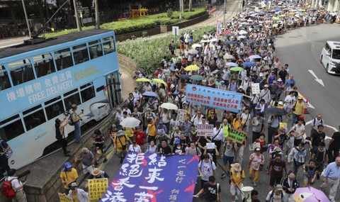 Hong Kong ngày 1-7: Chính quyền vui lễ, dân tuần hành - Ảnh 2. Hong Kong ngày 1-7: Chính quyền vui lễ, dân tuần hành - Ảnh 2.