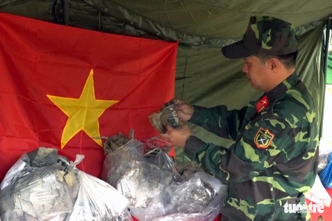 Phát hiện nhiều mộ liệt sĩ trong vườn nhà dân - Ảnh 1. Phát hiện nhiều mộ liệt sĩ trong vườn nhà dân - Ảnh 1.