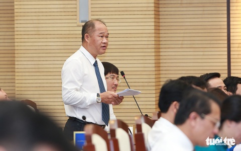 HĐND Hà Nội lo cháy máy vì nhiều đại biểu bấm nút chất vấn - Ảnh 1. HĐND Hà Nội lo cháy máy vì nhiều đại biểu bấm nút chất vấn - Ảnh 1.