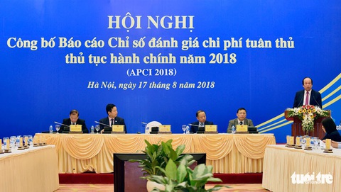 Doanh nghiệp vẫn nặng gánh thủ tục hành chính - Ảnh 1. Doanh nghiệp vẫn nặng gánh thủ tục hành chính - Ảnh 1.