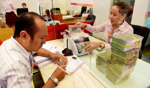Siết tín dụng, lãi suất có tăng? - Ảnh 1. Siết tín dụng, lãi suất có tăng? - Ảnh 1.