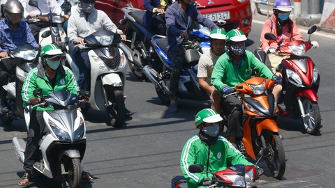 Singapore phạt Grab và Uber 9,5 triệu USD - Ảnh 1. Singapore phạt Grab và Uber 9,5 triệu USD - Ảnh 1.