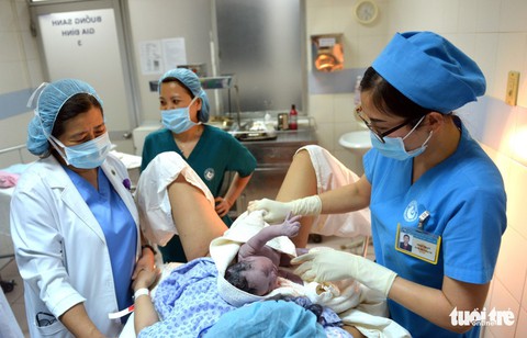 Những công dân đầu tiên của TP.HCM năm 2018 - Ảnh 4. Những công dân đầu tiên của TP.HCM năm 2018 - Ảnh 4.