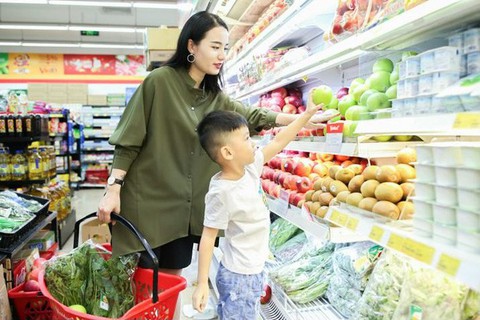 Phụ nữ dành 1/4 cuộc đời để làm việc không lương - Ảnh 1. Phụ nữ dành 1/4 cuộc đời để làm việc không lương - Ảnh 1.