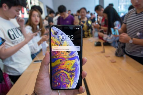 iPhone giảm giá sâu ở Trung Quốc vì bị chê... đắt - Ảnh 1. iPhone giảm giá sâu ở Trung Quốc vì bị chê... đắt - Ảnh 1.