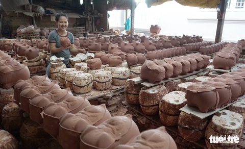 Ngạc nhiên với nghề làm heo đất cho mùa Tết Nguyên đán - Ảnh 5. Ngạc nhiên với nghề làm heo đất cho mùa Tết Nguyên đán - Ảnh 5.