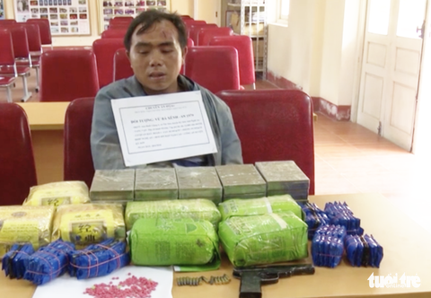 Tử hình thầy giáo ôm súng buôn 20 bánh heroin - Ảnh 1. Tử hình thầy giáo ôm súng buôn 20 bánh heroin - Ảnh 1.