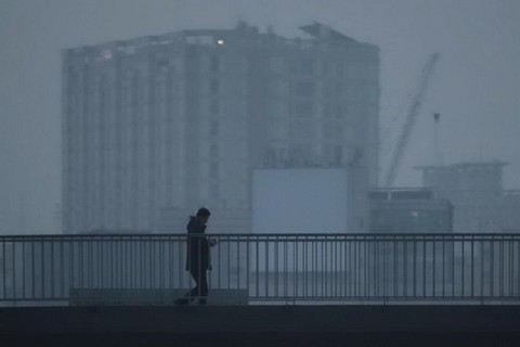 Bụi mịn tấn công nhiều nước châu Á - Ảnh 1. Bụi mịn tấn công nhiều nước châu Á - Ảnh 1.