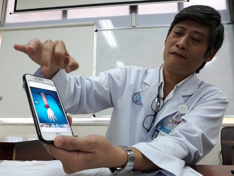 Cứu sống bàn tay bị chém đứt lìa - Ảnh 1. Cứu sống bàn tay bị chém đứt lìa - Ảnh 1.