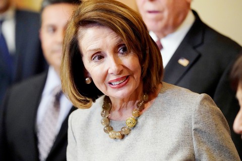 Ông Trump tạm nhượng bộ phe Dân chủ - Ảnh 1. Ông Trump tạm nhượng bộ phe Dân chủ - Ảnh 1.