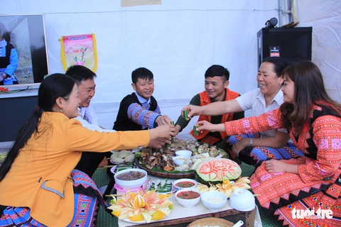 Mâm cơm ngày Tết của bà con dân tộc có gì đặc biệt? - Ảnh 1. Mâm cơm ngày Tết của bà con dân tộc có gì đặc biệt? - Ảnh 1.