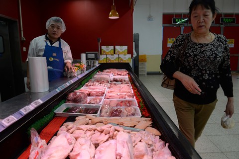 Trung Quốc dùng lá bài thịt heo trả treo với Mỹ - Ảnh 1. Trung Quốc dùng lá bài thịt heo trả treo với Mỹ - Ảnh 1.