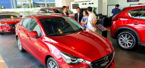 Ôtô, xe máy nhộn nhịp trình làng mẫu mùa Tết - Ảnh 1. Ôtô, xe máy nhộn nhịp trình làng mẫu mùa Tết - Ảnh 1.