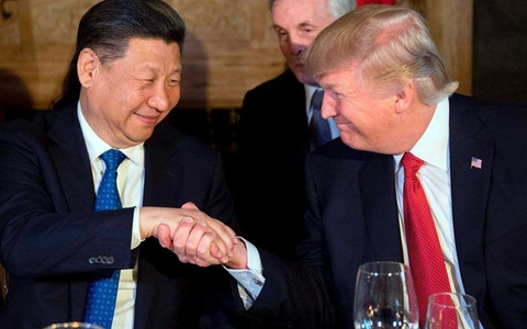 Quà Giáng sinh cho thị trường từ thỏa thuận Mỹ - Trung - Ảnh 1. Quà Giáng sinh cho thị trường từ thỏa thuận Mỹ - Trung - Ảnh 1.