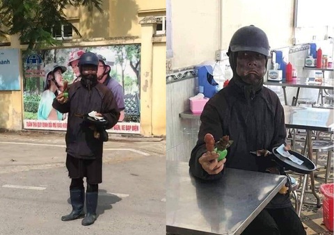 Công an truy tìm ninja đen cầm đầu gà, xúc xích đi xin tiền ở Hà Nội - Ảnh 2. Công an truy tìm ninja đen cầm đầu gà, xúc xích đi xin tiền ở Hà Nội - Ảnh 2.
