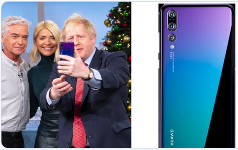 Thủ tướng Anh bị phát hiện dùng điện thoại Huawei trên truyền hình - Ảnh 1. Thủ tướng Anh bị phát hiện dùng điện thoại Huawei trên truyền hình - Ảnh 1.