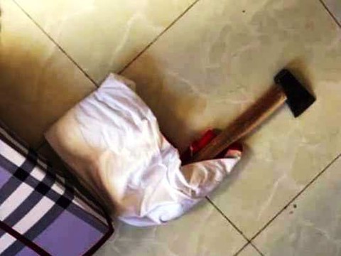 Kẻ tâm thần phóng xe máy chém 3 người đi đường - Ảnh 3. Kẻ tâm thần phóng xe máy chém 3 người đi đường - Ảnh 3.