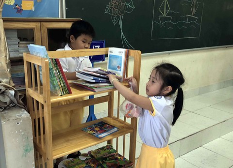 Hạnh phúc nhỏ bé từ sách - Ảnh 1. Hạnh phúc nhỏ bé từ sách - Ảnh 1.