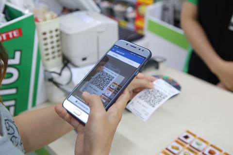 Sắp có tiêu chuẩn QR Code để thanh toán không dùng tiền mặt - Ảnh 1. Sắp có tiêu chuẩn QR Code để thanh toán không dùng tiền mặt - Ảnh 1.