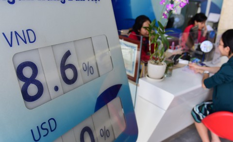 Sau tuyên bố sẵn sàng bán ngoại tệ can thiệp, tỉ giá USD hạ nhiệt - Ảnh 1. Sau tuyên bố sẵn sàng bán ngoại tệ can thiệp, tỉ giá USD hạ nhiệt - Ảnh 1.