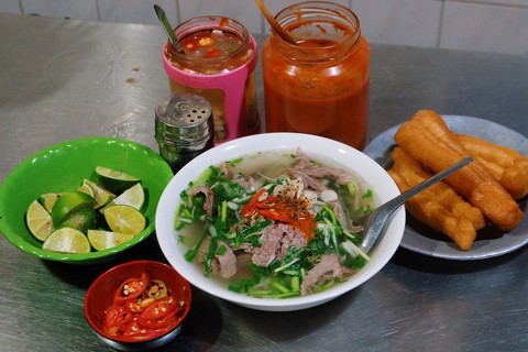 Phở Thìn, bún thang bán không ngơi tay những ngày thượng đỉnh Mỹ - Triều - Ảnh 2. Phở Thìn, bún thang bán không ngơi tay những ngày thượng đỉnh Mỹ - Triều - Ảnh 2.