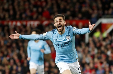 HLV Guardiola nhìn về chức vô địch sau trận derby Manchester - Ảnh 4. HLV Guardiola nhìn về chức vô địch sau trận derby Manchester - Ảnh 4.