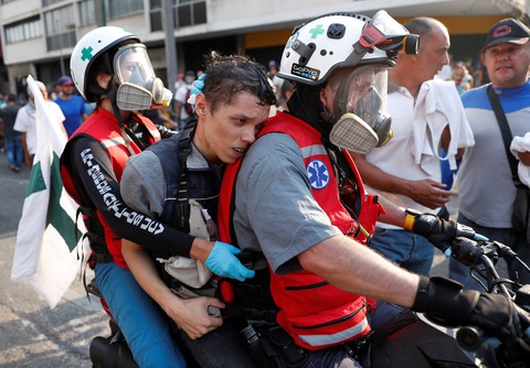 Washington nói Tổng thống Venezuela suýt rời đi tị nạn ở Cuba - Ảnh 2. Washington nói Tổng thống Venezuela suýt rời đi tị nạn ở Cuba - Ảnh 2.