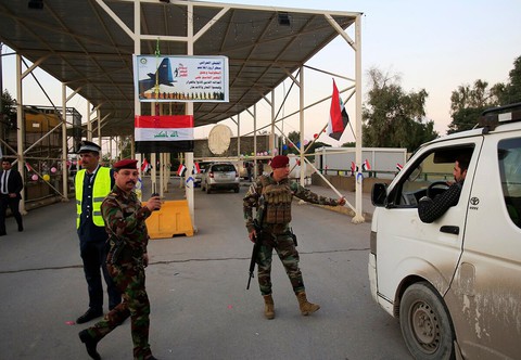 Pháo rocket bắn xuống gần sát đại sứ quán Mỹ tại Baghdad - Ảnh 1. Pháo rocket bắn xuống gần sát đại sứ quán Mỹ tại Baghdad - Ảnh 1.
